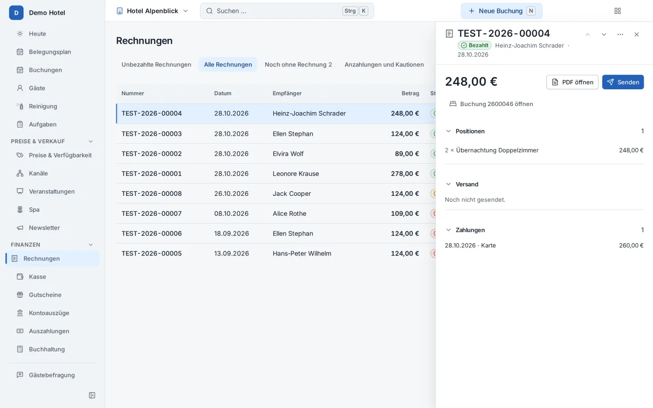 Eine ausgestellte, bezahlte Rechnung in Destmio mit Positionen, Versand und Zahlung